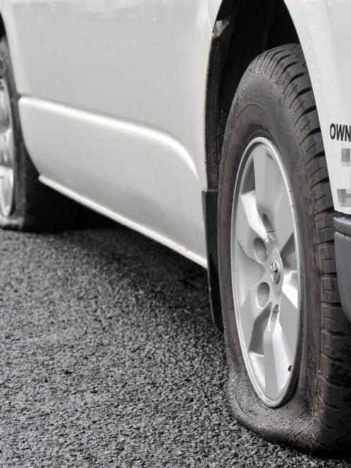 The slashed tyres of an Airport Shuttles Dunedin van could indicate a malicious rivalry within...