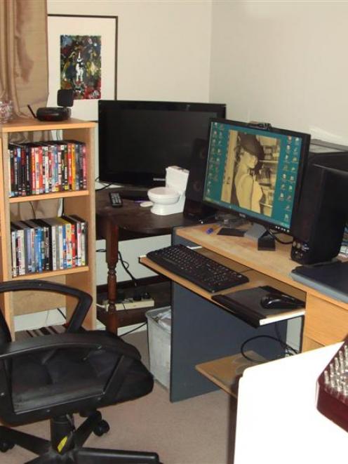 The southwest corner of literary and musical man cave.   Note Hayley Mills adorning the computer...
