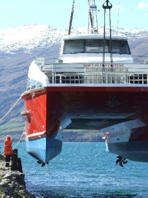 The Spirit of Queenstown is lowered into Lake Wakatipu at Kingston. Photo by Christina McDonald.