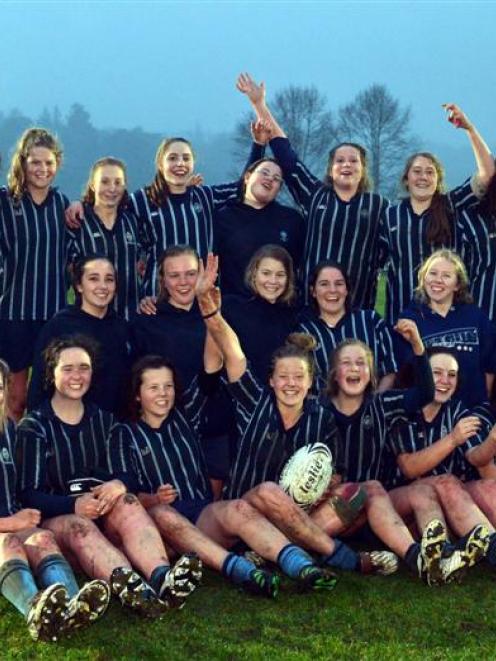 The St Hilda's Collegiate girls rugby team celebrates winning the Otago secondary schools...