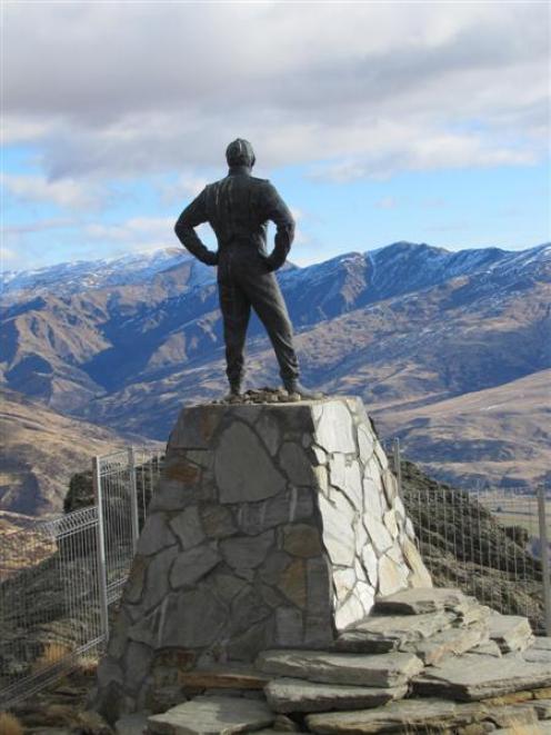 The  statue of rally driver Possum Bourne looks over the Cardrona Valley,  about 9km up the Snow...