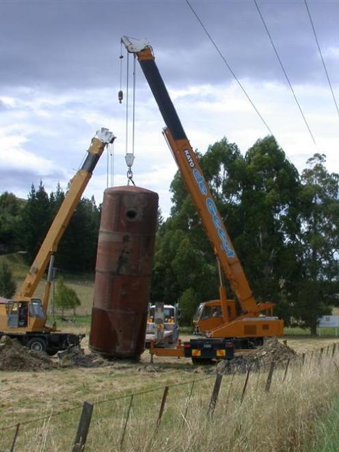 The Steampunk tank is hoisted into place. Photo by David Bruce.