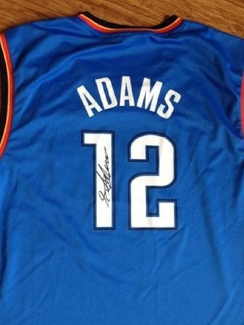The Steven Adams-autographed singlet that is part of the prize package in the basketball lottery....