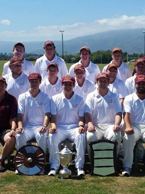 The victorious North Otago team with the spoils following its Hawke Cup win against Buller...