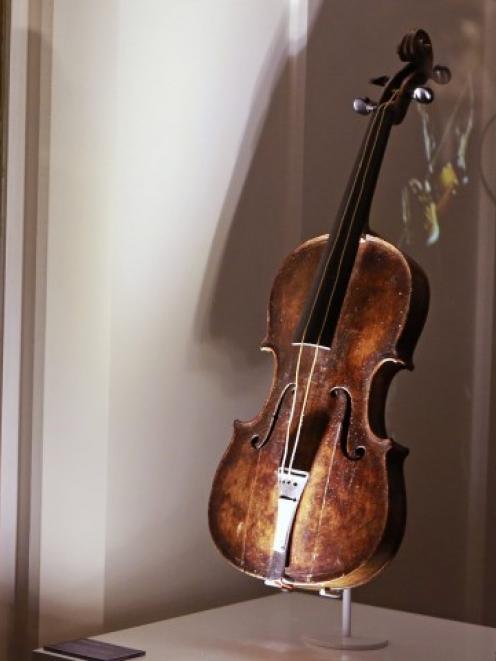 The violin on display at the Titanic Centre in Belfast. REUTERS/Cathal McNaughton