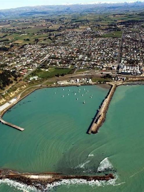 The Waitaki District Council is to consider options to repair Holmes Wharf, pictured centre right...