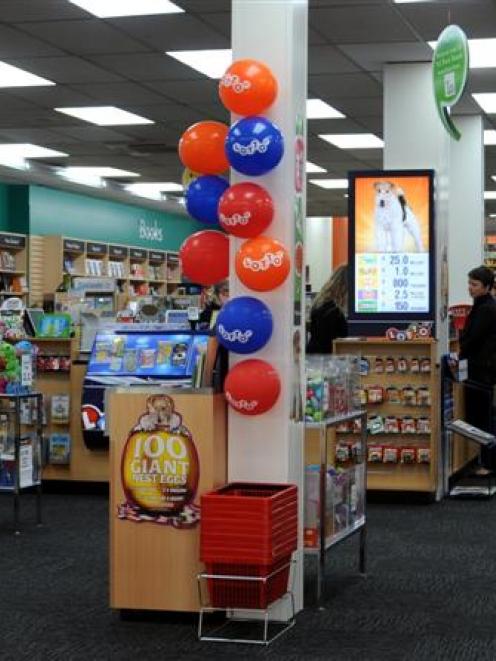 The Whitcoulls island is behind the post in the middle of the shop in this photograph taken from...