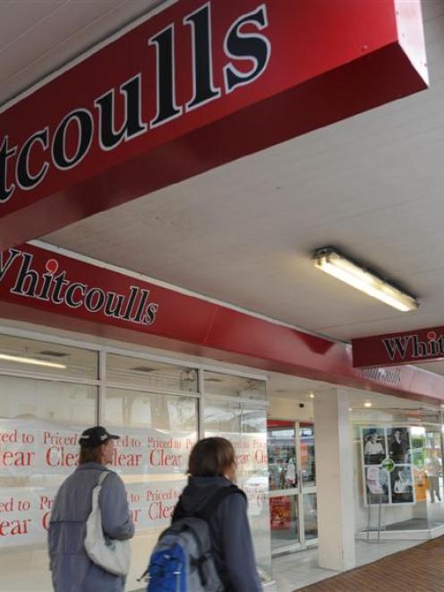 The Whitcoulls store in George St, Dunedin, is among those continuing to trade. Photo by Peter...