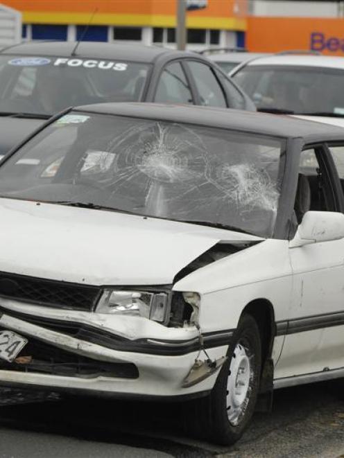 The white Subaru involved in a nose-to-tail crash in Andersons Bay Rd, Dunedin, last night.