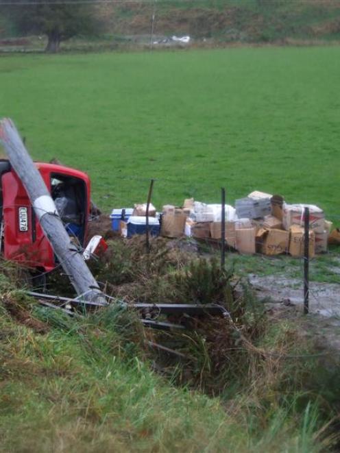 The wreckage of a courier van after a crash near Lawrence yesterday in which driver Gavin George...