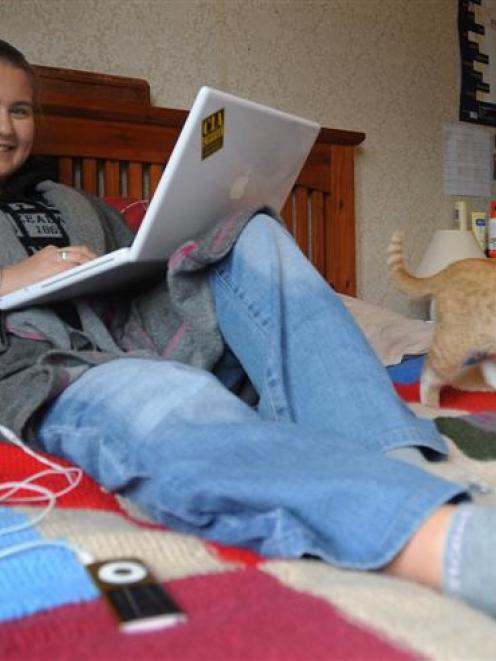 Third-year University of Otago student Zara Coghill (20) studies in her Northeast Valley flat,...