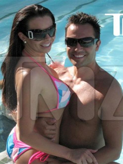 This August 2009 photo provided by TMZ, shows Jasmine Fiore, left, and her husband Ryan Alexander...