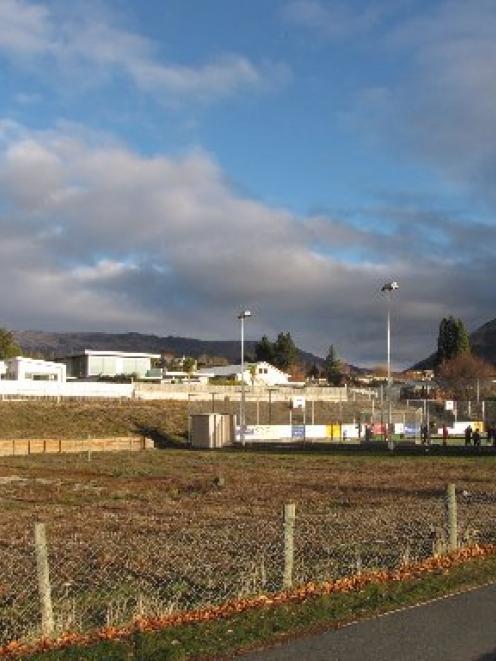 This block of land in Warren St in Wanaka, containing most of the synthetic sports turf (right),...