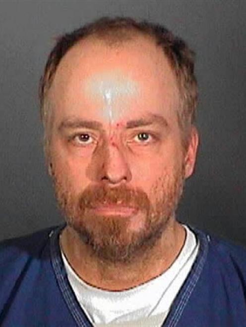 This booking photo released by the Los Angeles County Sheriff's Department shows former 1970s...