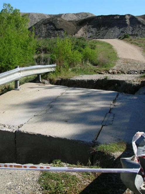 This collapsed one-lane bridge across Fraser River on Marshall Rd at Earnscleugh has to be...