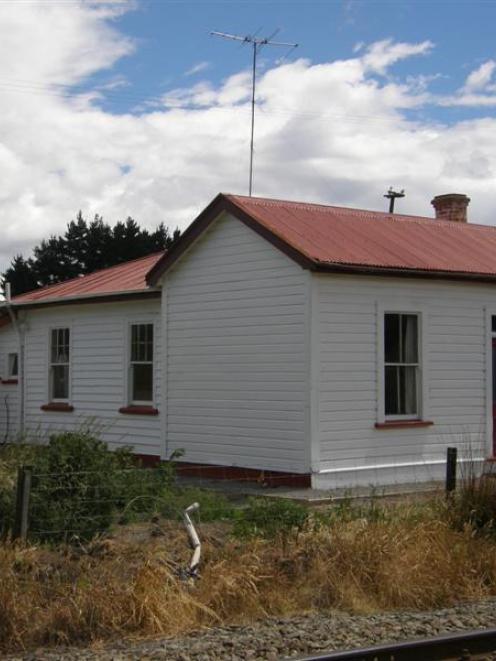 This cottage at Hillgrove, between the railway line and State Highway 1, has sold for $28,000....