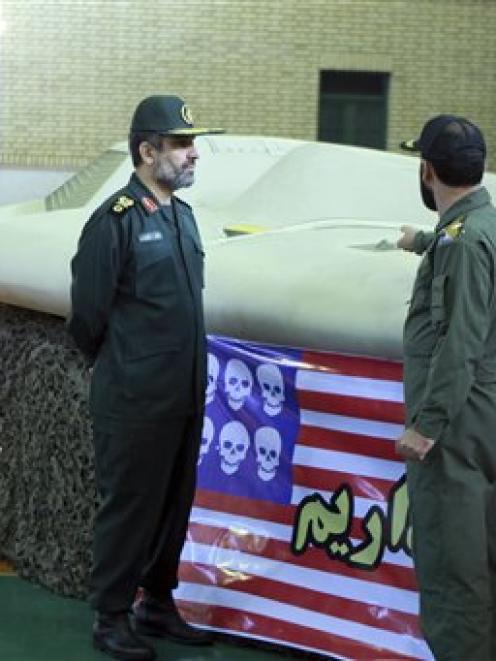 This photo released by the Iranian Revolutionary Guards, claims to show the chief of the...