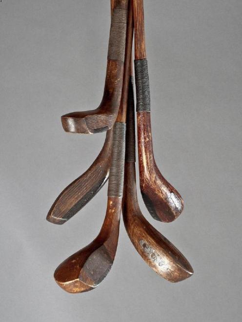 This set of golf clubs, said to be the earliest known examples of traditional hand-crafted club...