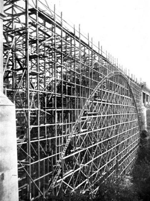 This temporary wooden structure is the supporting framework for the huge ferroconcrete arch, 320...