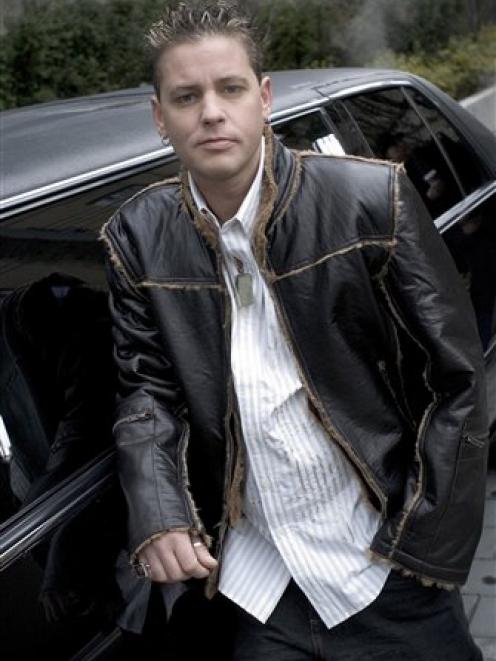 This undated publicity image provided by A&E shows actor Corey Haim.