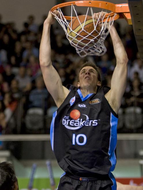 Thomas Abercrombie, of the Breakers, scores against the Tigers during the ANBL Basketball Match...