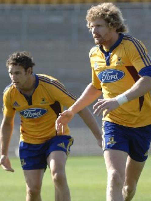 Highlanders flanker Adam Thomson (right) trains with skipper Craig Newby at the Highlanders’...