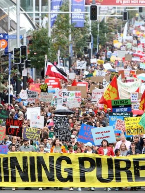 Thousands turn out to march up Auckland's Queen St protesting against the Governments mining...
