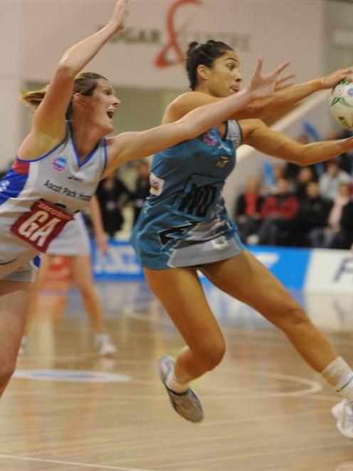 Thunderbirds wing defence Mo'onia Gerrard snares the ball ahead of Steel goal attack Donna...