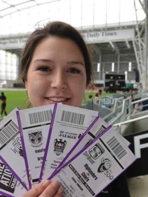 Ticketing assistant Whitney Kooman with tickets for events at Forsyth Barr Stadium. Photo by...