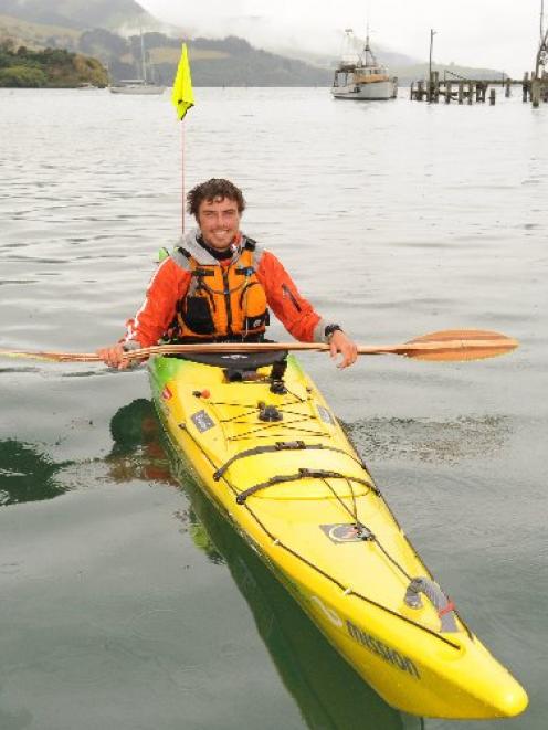 Tim Taylor at Careys Bay on his circumnavigation of New Zealand. Photo by Gregor Richardson.