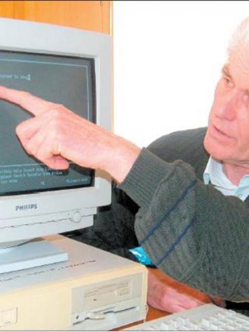 Timaru mathematician and computing expert Philip Tomlinson with the working model of the Bain...