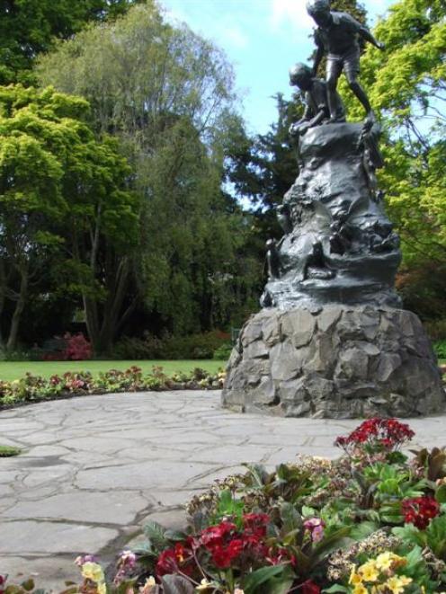 Time flies in the Wonderland gardens in the Oamaru Public Gardens. Photo by Sally Rae.