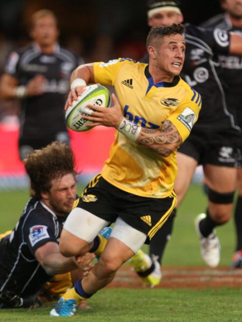 TJ Perenara of the Hurricanes on attack. (Photo by Steve Haag/Gallo Images/Getty Images)