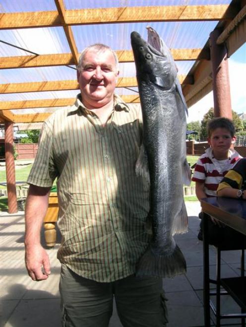Toby Templeton, of Cromwell, with a 4.426kg (9.77lb) brown trout he caught in Lake Hawea on...