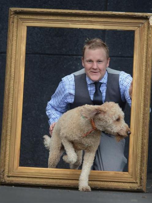 Toitu Otago Settlers Museum exhibition developer William McKee, with his dog Louis (2), is...