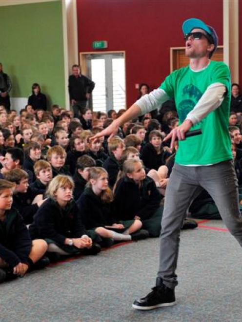 Tom McFadden uses hip-hop to teach pupils at Tahuna Normal Intermediate yesterday  about complex...