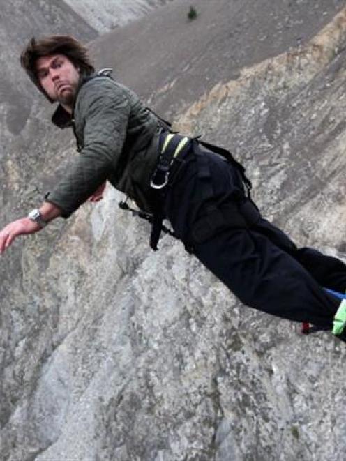 Tom Palmer, the England lock, dives off at the 134m high Nevis Bungy.  (Photo by David Rogers...