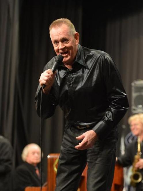 Tom Sharplin performs in Mosgiel's packed Coronation Hall on Friday. Photo by Stephen Jaquiery.