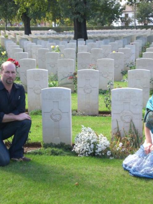 Tony and Jane Campbell beside the graves of their great-uncles, Gavin Campbell and Bill Goodall,...