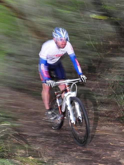 Tony Hogg trains for the world championships on the Signal Hill mountain bike track near Logan...