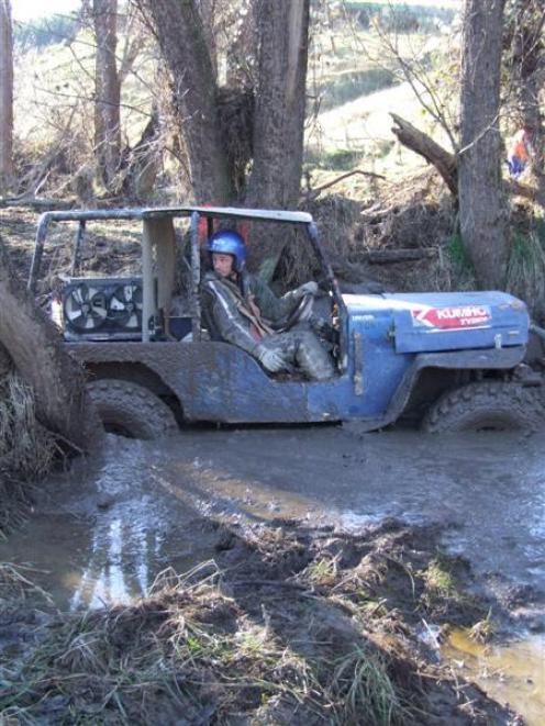 Tony Laird, of Gore, waits for a tow out of the mud during the Rotary Club of Waitaki's 4WD mud...