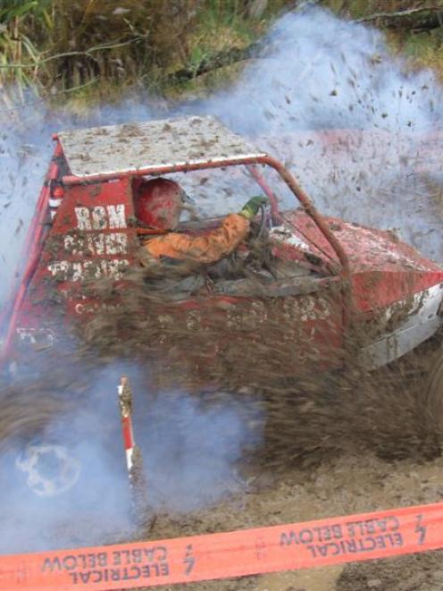 Tony Richardson negotiates a hazard during the Rotary Club of Waitaki's four-wheel-drive mud-plug...