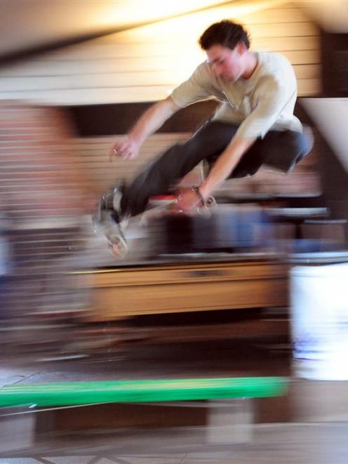 Top Dunedin skateboarder Nick Bright (23) gets some air during the Captain Cook skate jam...