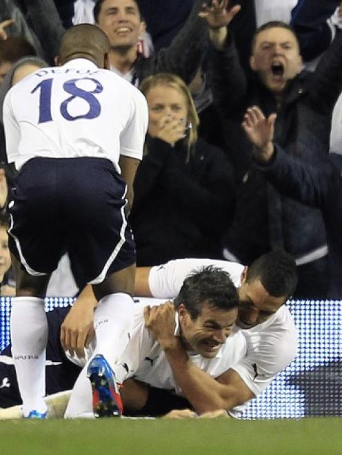 Tottenham Hotspur's Ryan Nelsen (C) celebrates his goal against Bolton Wanderers with Jake...