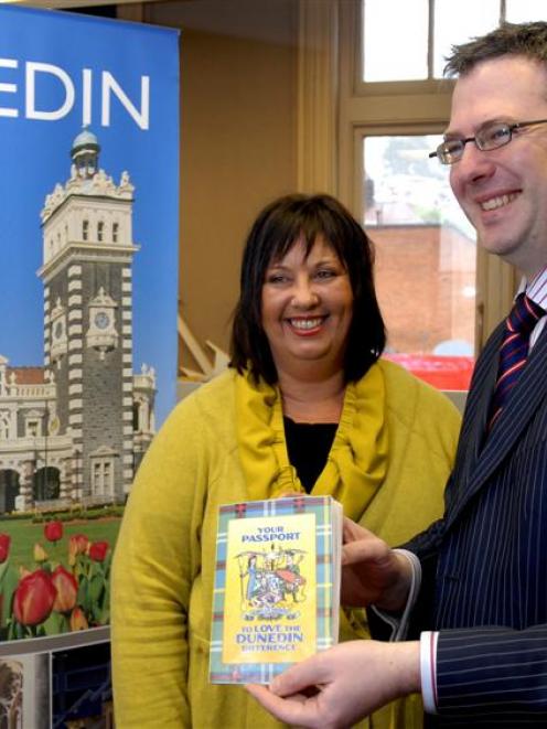 Tourism Dunedin marketing manager Michelle Jack and chief executive Hamish Saxton with a mock-up...
