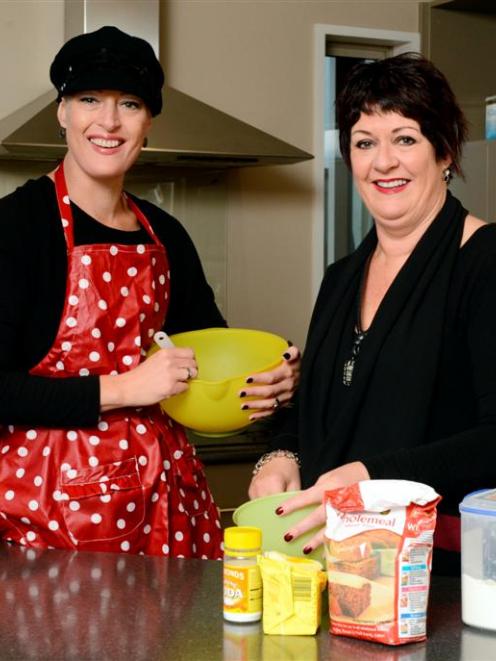 Trista Townsend and mother Elaine Schuck  prepare for next week's baking fundraiser. Photo by...