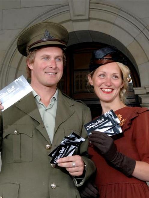 Trying on some suitable garb for the 1940s-themed 2011 Middlemarch Singles Ball are Mike...