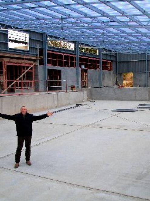 Tuapeka Aquatic Centre chairman Garry McCorkindale has a look at the new swimming pool and...