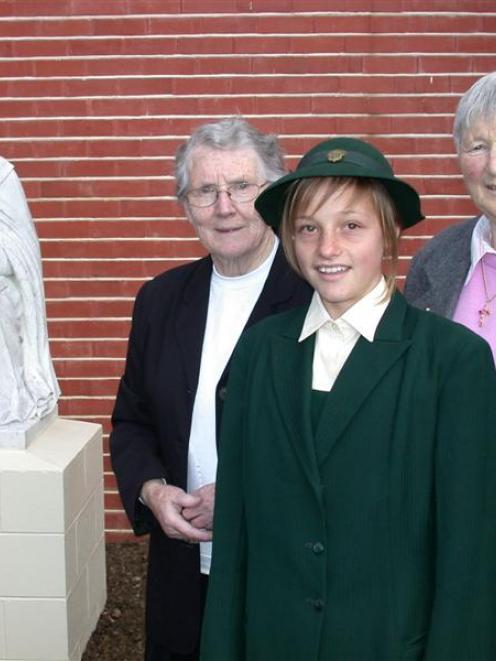 Two former Teschemakers teachers (rear, from left) Sister Madeleine McAleese and Sister Adrienne...