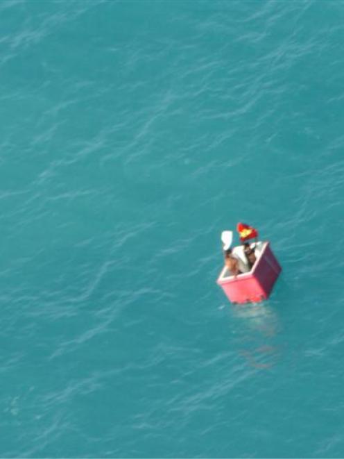 Two men rescued near Thursday Island on Saturday by a Customs aircraft. Photo from Australian...